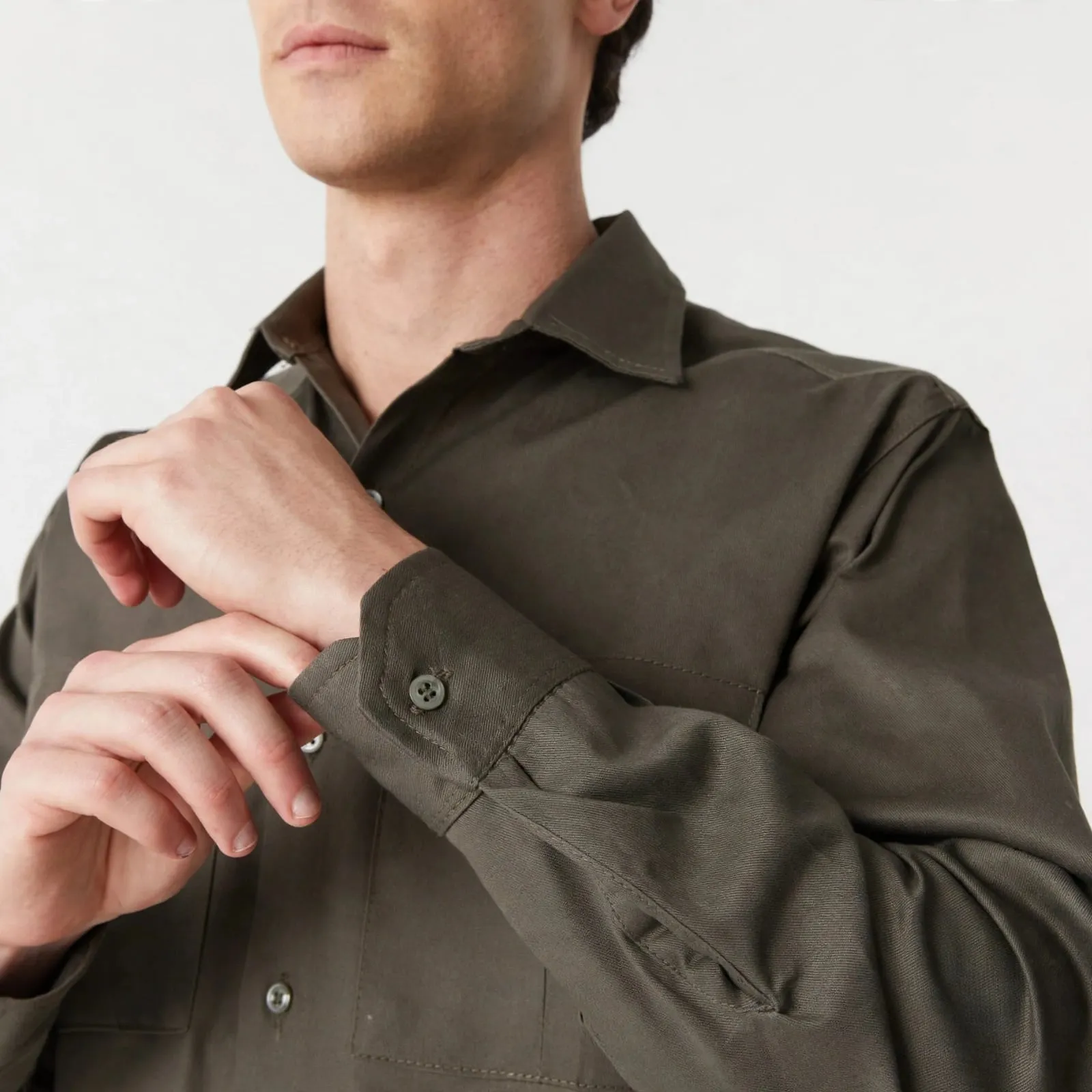Camisa de trabajo verde, detalle de la tela